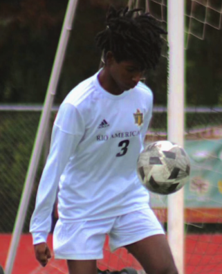 Idriss gains possession of the ball during a game. Photo provided by him.