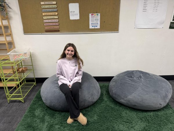 Wellness Center organizer Marina Kidwell (12) in the newly created space, which features bean bags, stress toys and a seating area. Kidwell worked to create the space with fellow Civitas student Elisheva Joelson.