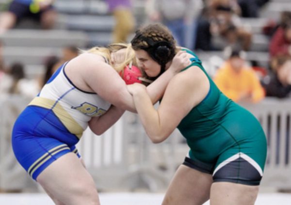Junior Liliana Lettini competes at a wrestling match. Photo provided by coach Austin Bell.