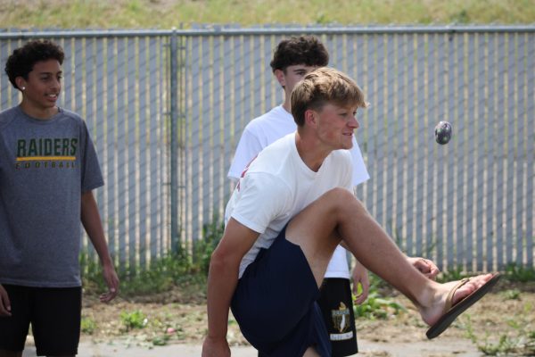 Senior Marty Lundberg goes for a bicycle kick.
