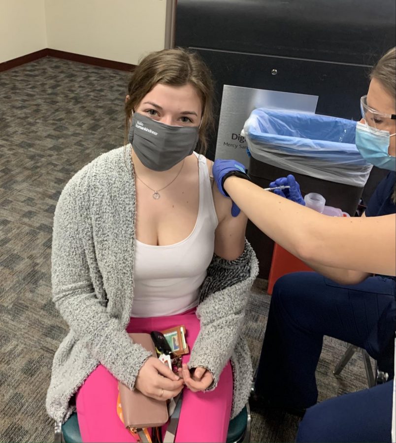 Senior Emma Hutchinson receives her first dose of the Pfizer COVID-19 vaccine. (Covid-19, January 2021)