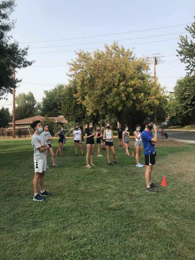 The cross country team lines up in socially distant pods for conditioning through their coach's club Sacramento Valley Endurance.
(Covid-19, Dec. 2020)