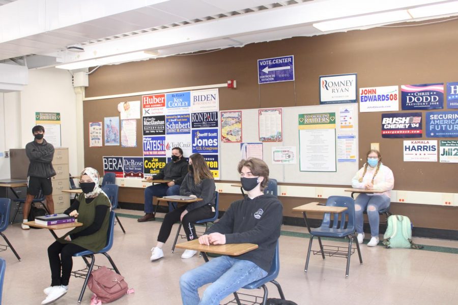 Students stay at least 3 feet away, per CDC guidelines, and keep their masks on to prevent the spread of COVID-19 in classrooms. (Covid-19)